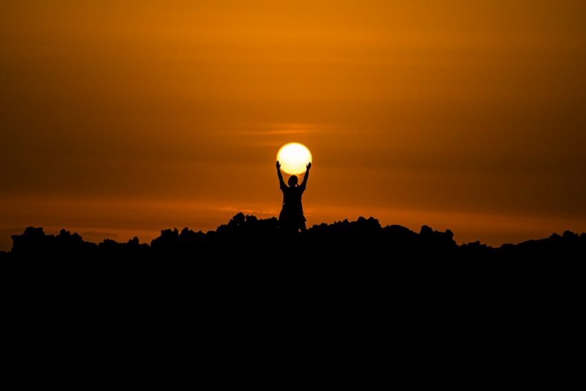 silhouette of person holding dun