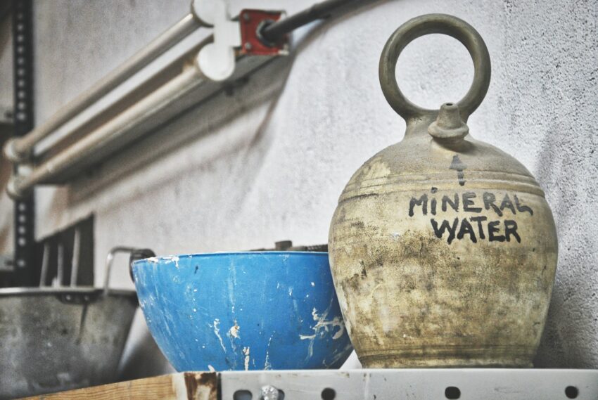 blue bowl and white mineral water jug