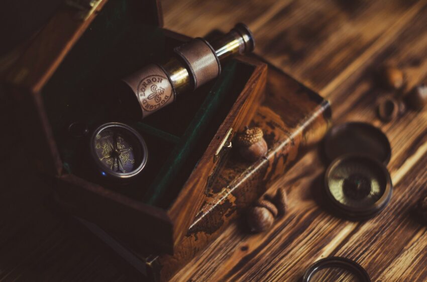 a wooden box filled with a couple of bottles of wine